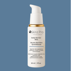 bottle labeled Skinz.Pro Daily Barrier Mist on a blue background